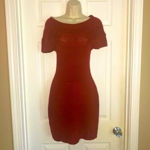Deep red or wine color sweater dress with front pocket.